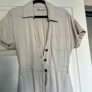 Small, cream colored Zara jumpsuit